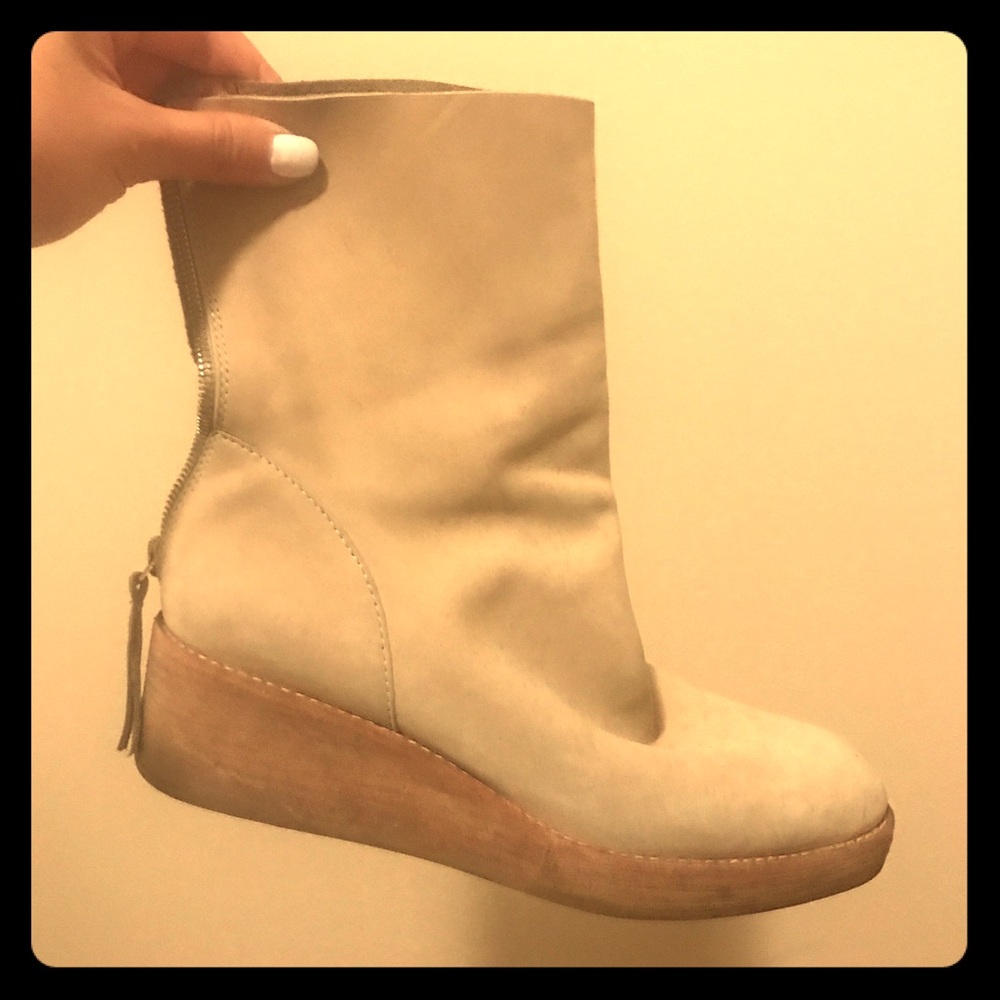 Beige soft suede boots with wooden wedge heels